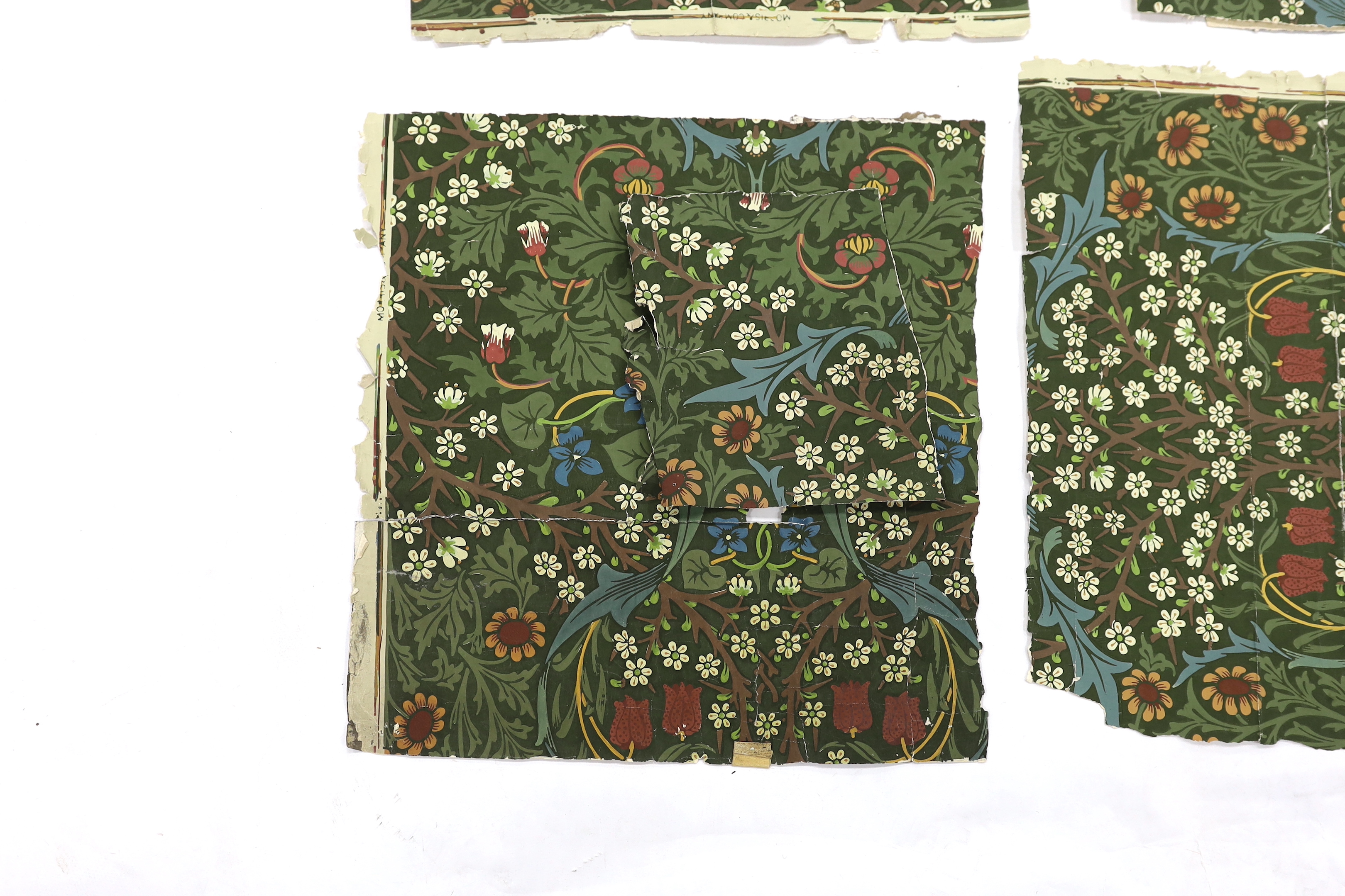 Morris and Company block-printed wallpaper fragments, the selvage on some fragments printed with Morris and Company